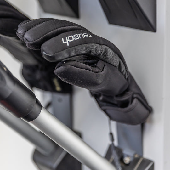 The solid metal glove attachment on the Koralp Dryer mounts directly behind the drying tube housing, drying snow gloves with indirect airflow.